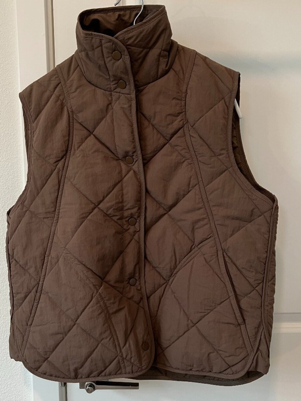 Brown quilted puffer vest